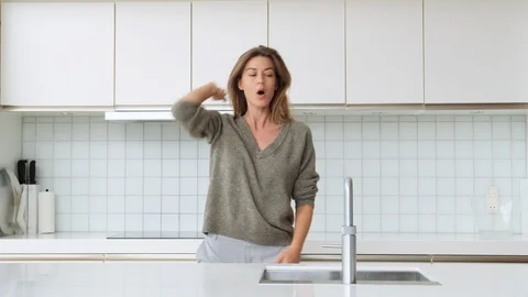 Woman Dancing In Kitchen Video stock 117061503