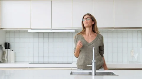 Woman Dancing In Kitchen Stock Footage 117061596