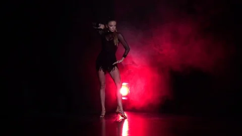 Woman dancing rumba in the studio. Slow motion Stock Footage 69795953
