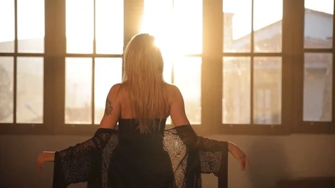 The woman is dancing at sunset Stock Footage
