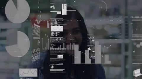 Woman data analyst reviewing tech office, viewing floating bar charts pie chart Stock Footage 325962141