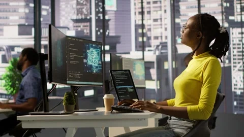 Woman debugging and optimizing code using AI Stock Footage 318238580