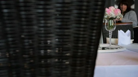 A woman decorates the table for a wedding Stock Footage 89942327