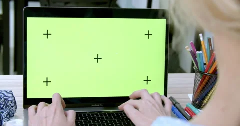 Woman designer using device at the table at her studio Stock Footage 170634738