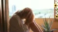 Woman desperate on terrace at home HD Footage