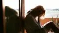 Woman desperate on terrace at home (tracking) HD Footage