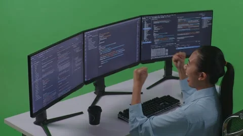 Woman Developer Celebrating And Dancing While Write Code With Multiple Vídeos de archivo 252577696