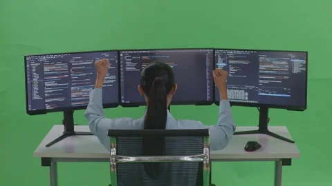 Woman Developer Celebrating While Write Code With Multiple Computer Screens Stock Footage 252564321