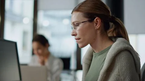 Woman developer checking code closeup. Focused software engineer work computer Foto stock