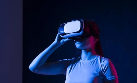 Woman developer, designerm architector using VR headset to designing a new 스톡 사진