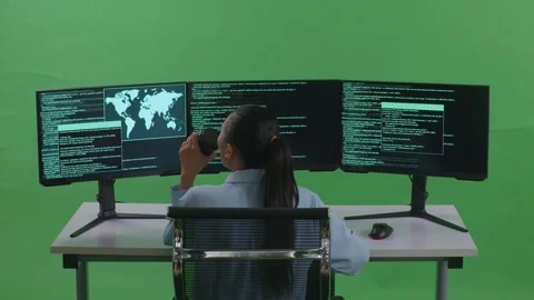 Woman Developer Drinking Coffee And Using Computer To Write Code With Multiple Stock Footage 252566988