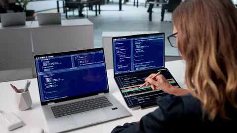 Woman Developer Reviews Code Changes Stock Footage 340404729