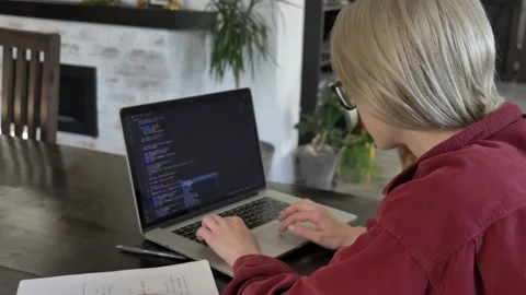 Woman developer working with computer at home office Stock Footage 162194620