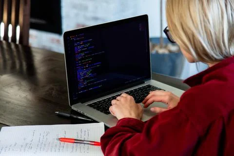 Woman developer working with computer at home office 写真素材