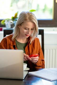 Woman developer working with computer at home office Stock Photos