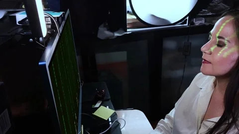 Woman develops matrix animation code by programming with tech language bina.. Stock Footage 231705265