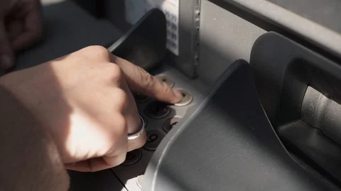 Woman dials the code on the ATM keyboard Stock Footage 106610598