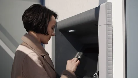 Woman dials the code on the ATM keyboard 库存影片 106610654