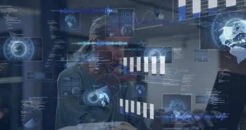 Woman dictating into phone while typing on laptop in office, building chart Vídeos de archivo 328469735