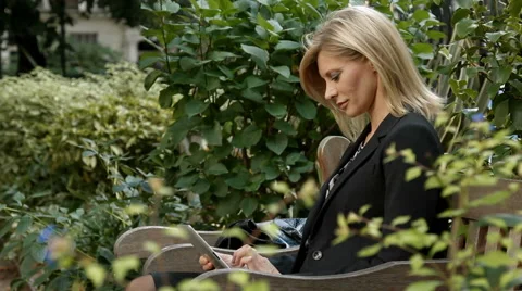 Woman with digital tablet Stock Footage 40107402
