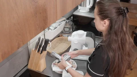 Woman Disassembles Electric Meat Grinder for Cleaning After Use in Kitchen Stock Footage 309940355