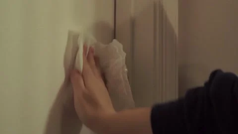 Woman Disinfecting Door Knob Stock Footage