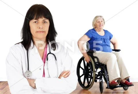 Woman doctor and handicap senior Stock Photos