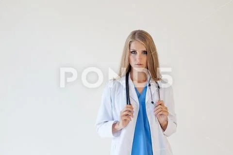 Woman doctor with stethoscope in hospital Stock Photos