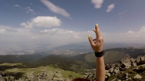 Woman does split on a rock Stock Footage 92874157