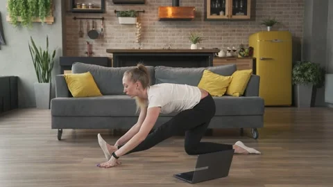 Woman does stretching exercises Stock Footage 150901713