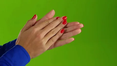 Woman doing applause her hands on a green screen background Stock Footage