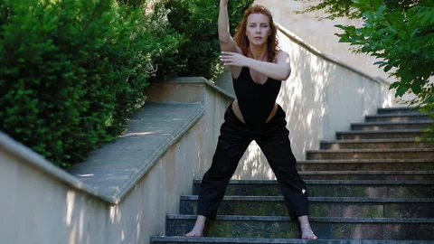 Woman doing bearhing exercise outdoors Video stock 115960892