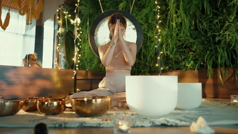 Woman doing Breathing Practice while Sitting Vídeos de archivo 282164013