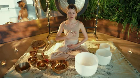 Woman doing Breathing Practice while Sitting Vídeos de archivo 282164088