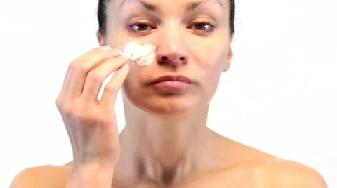 Woman doing cosmetic Stock Footage