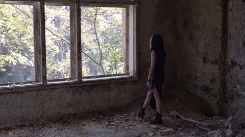 Woman doing a dance moviment in abandoned place Stock Footage 102671253