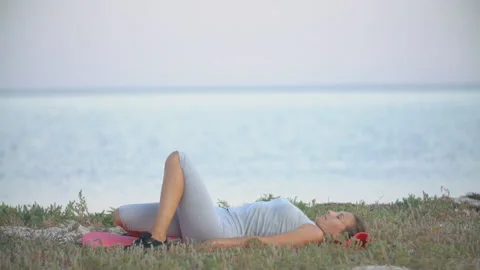 Woman doing exercise Stock Footage 129180948