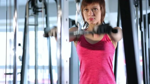 Woman doing exercise with at the gym Stock Footage 49484635