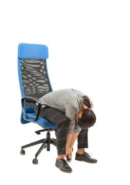 Woman doing exercises while she is sitting on office chair, isolated on white Stock Photos