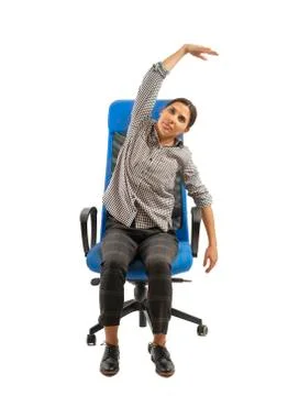 Woman doing exercises while sitting on the office chair Stock Photos