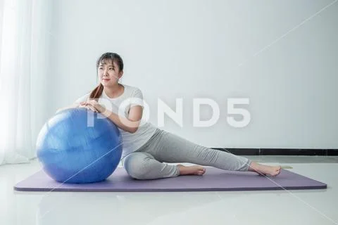 Woman doing fitness exercise Stock Photos