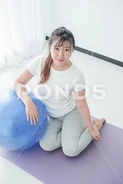 Woman doing fitness exercise Stock Photos