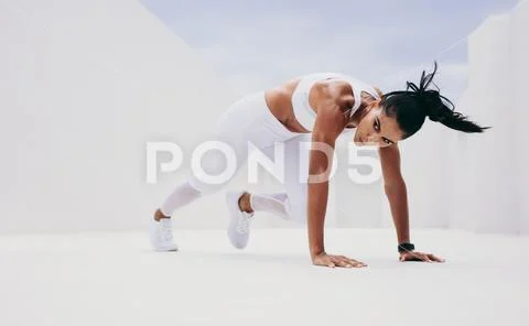 Woman doing fitness workout Stock Photos