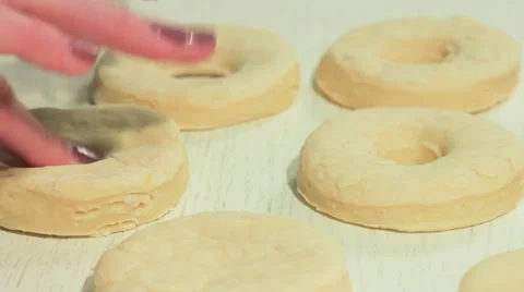 Woman doing the form for donuts Stock Footage 68909082
