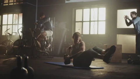 Woman doing kettlebell twist Stock Footage 236190553