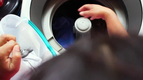 Woman Doing Laundry Stock Footage 83215033