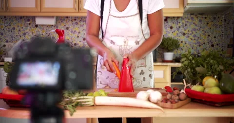 Woman doing live stream while cooking fruits, medium shoot Stock-Footage 142580978
