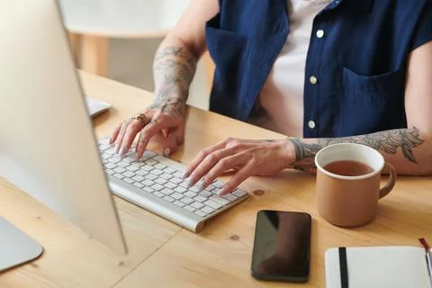 Woman doing online work on computer Stock Photos