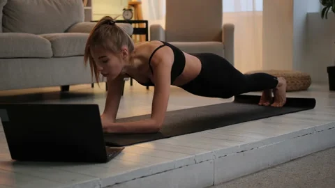 Woman is doing plank exercise Stock Footage 167302340
