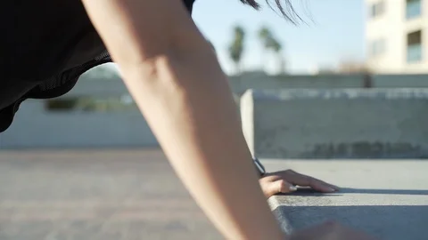 Woman doing push ups with support of a wall Stock Footage 105622355